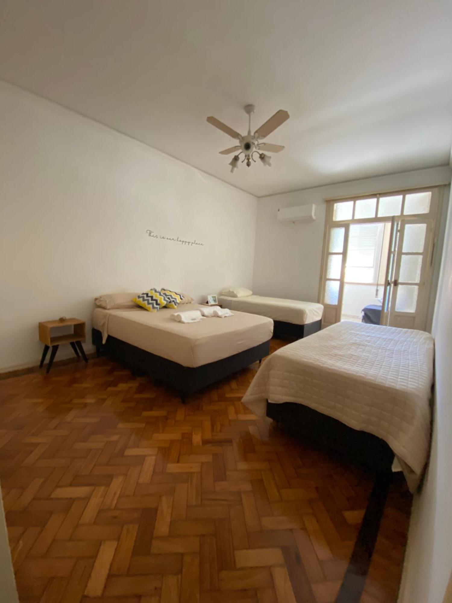 Hospedagem domiciliar Quarto Quadruplo Em Apartamento Compartilhado
